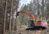 Develon diggers prove their worth on Highland forestry projects Develon excavator working in a forest