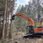 Develon diggers prove their worth on Highland forestry projects Develon excavator working in a forest