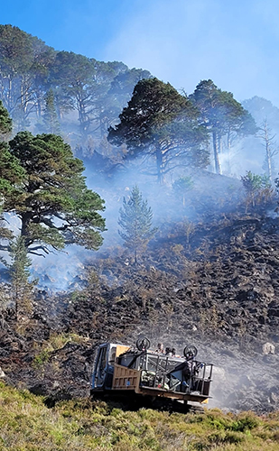Customised Morooka tracked dumper tackling wildfire