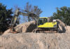 Safe digging specialist earns growth recognition Excavator on construction project