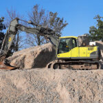 Safe digging specialist earns growth recognition Excavator on construction project