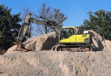 Safe digging specialist earns growth recognition Excavator on construction project