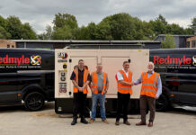 Redmyle expands fleet with Cat Stage V generator investment Handshake marking generator set deal between Redmyle and Finning