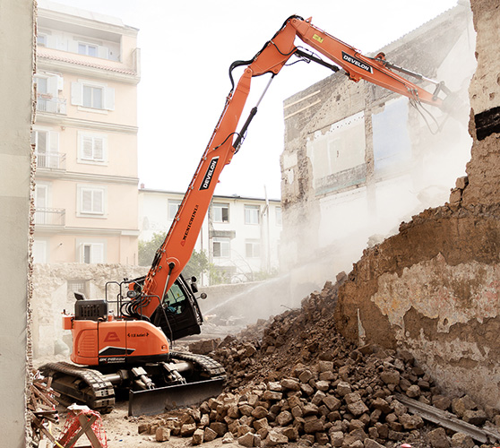 Building being demolished in Italy