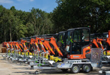 Flannery adds scores of new Kubota models to plant fleet Kubota mini-excavators lined up in a row