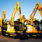 Select invests in safety technology for hire fleet Excavators lined up in yard